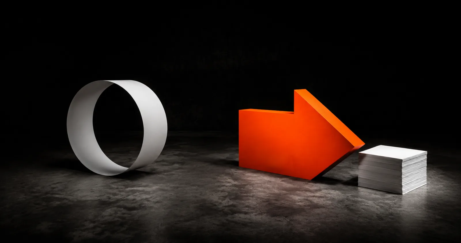 A white loop on one side and an orange arrow driving into a stack of paper on the other